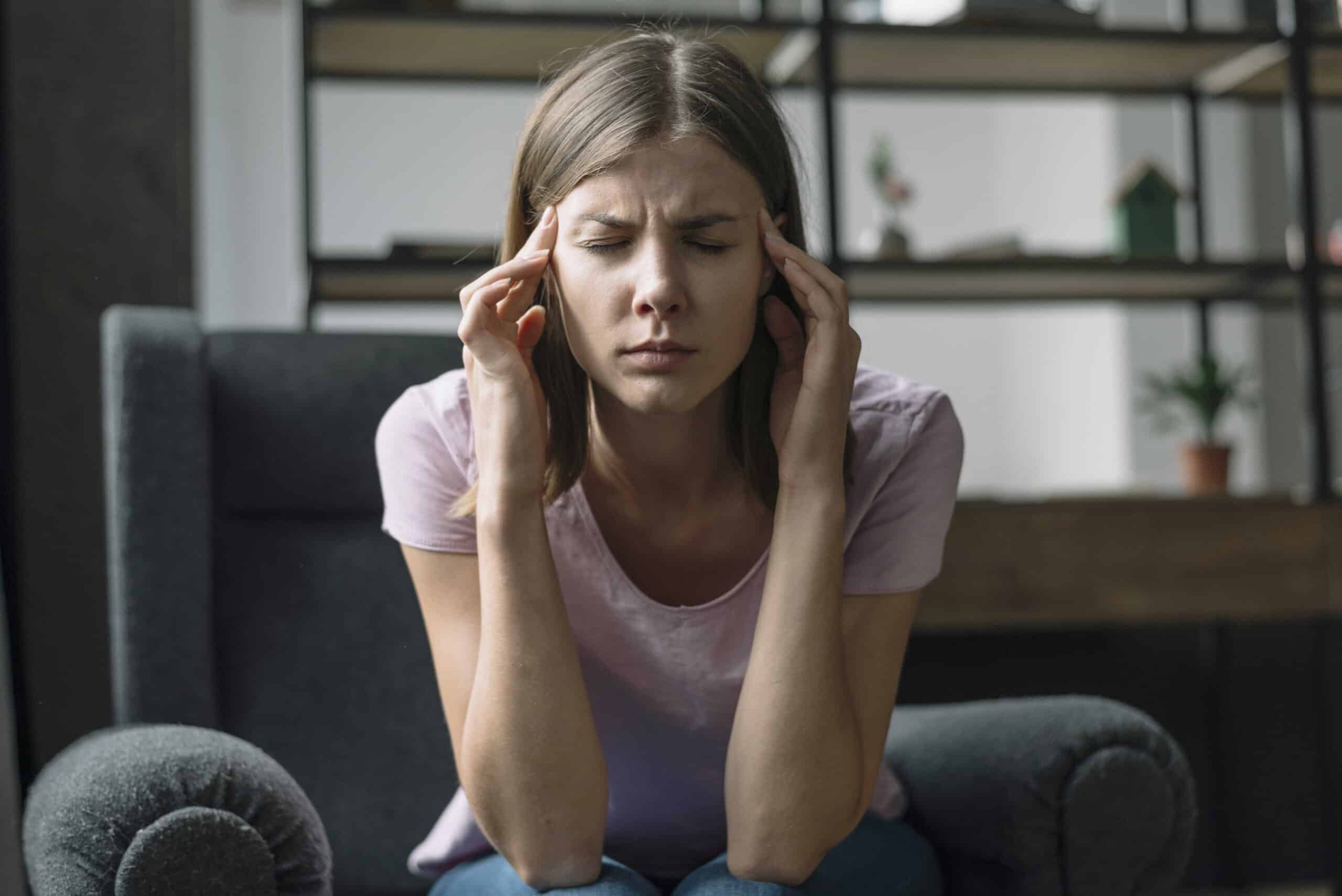 close-p-o-young-woman-suffering-from-headache_optimized