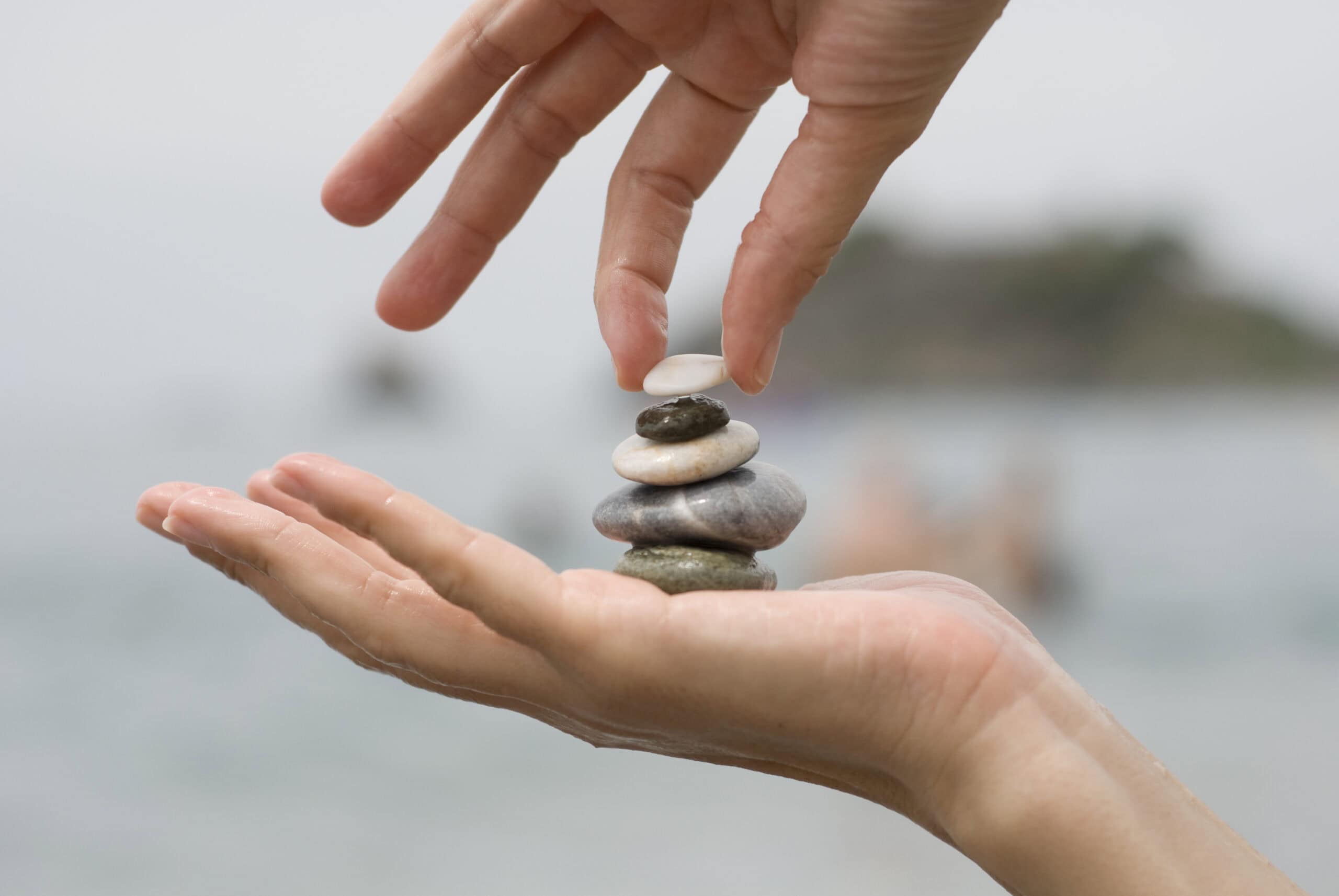 putting-last-pebble-pile-stones